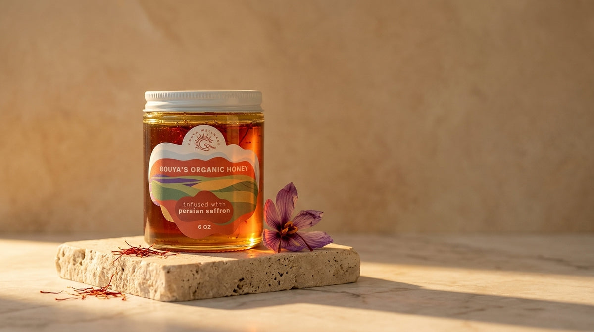 Saffron honey jar on a stone block in warm light beside a purple saffron crocus