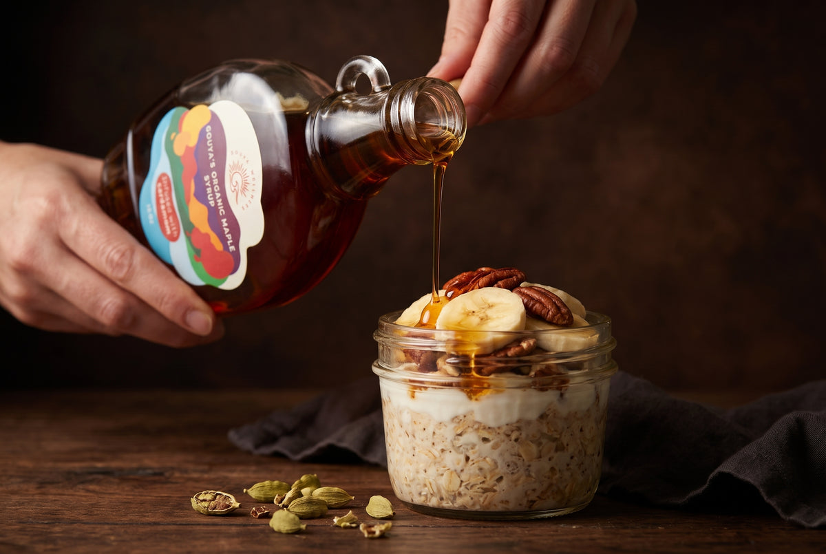 Cardamom maple syrup pouring over overnight oats